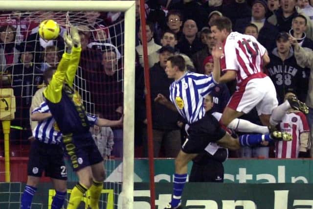 Kevin Pressman makes another first half save this time from Blades Phil Jagielka