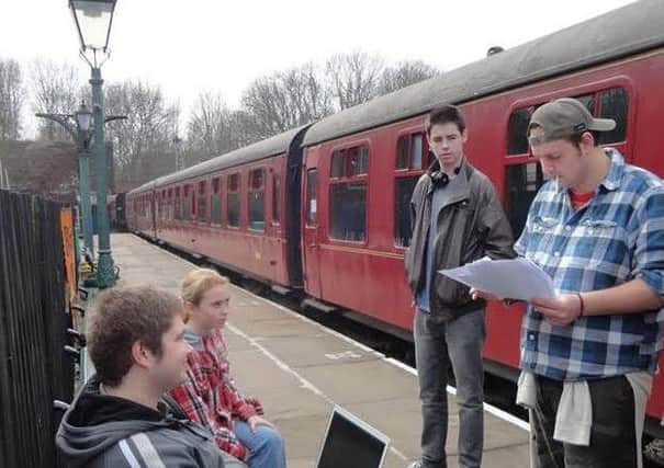 Behind the scenes filming of The Railway Carriage.