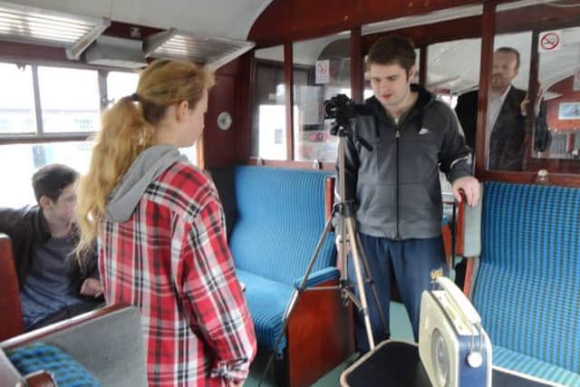 Behind the scenes duriing filming for The Railway Carriage.