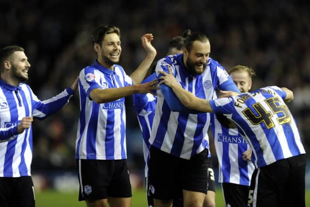 Fernando Forestieri is congratulated by team mates after opening the scoring for Wednesday