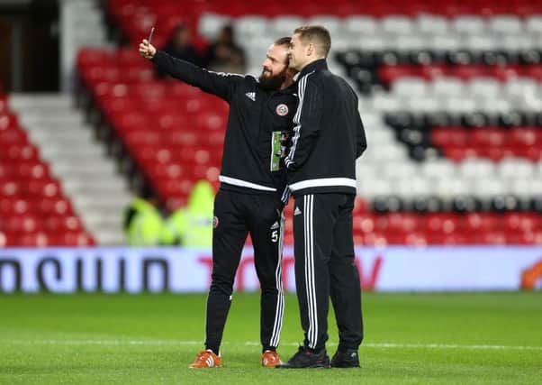 Sheffield United's John Brayford and Paul Coutts pose for the camera at Old Trafford Â©2016 Sport Image all rights reserved