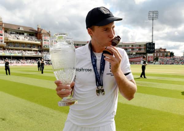 England's Joe Root celebrates their series victory during day four of the Fifth Investec Ashes Test at The Oval