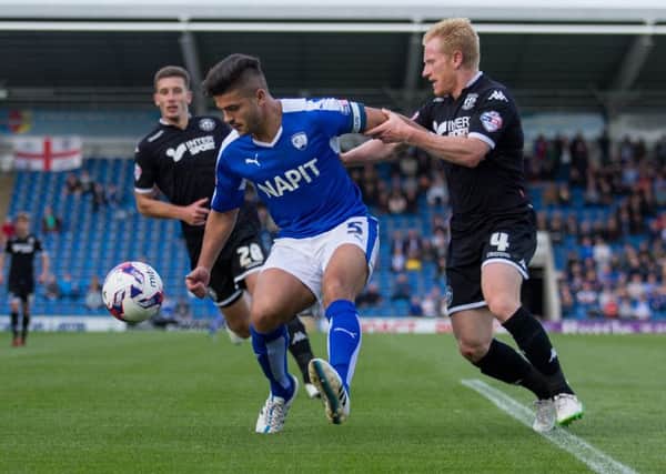 Chesterfield vs Wigan - Sam Morsy battles to keep possession - Pic By James Williamson