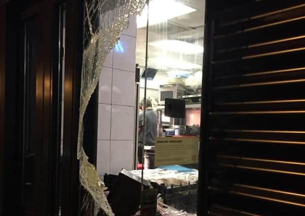 Two men riding a scooter smashed the drive-through window at Burger King, Valley Centretainment in Sheffield. They made off with an employees handbag with her engagement ring in it.