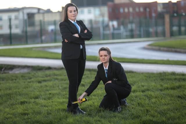 Sisters Ellie Young, 14, left and sister Mollie Young. 12, of Barnsley, who were told their school trousers were too tight