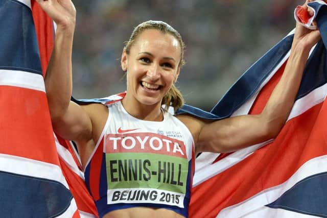Great Britain's Jessica Ennis-Hill celebrates after winning gold in the Women's Heptathlon after winning the 800m, during day two of the IAAF World Championships at the Beijing National Stadium, China. Photo credit: Martin Rickett/PA Wire.