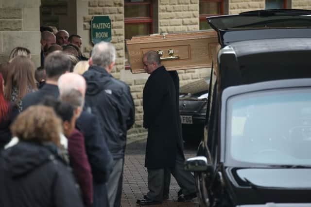 Caroline's coffin is carried in for her funeral. Picture: Ross Parry