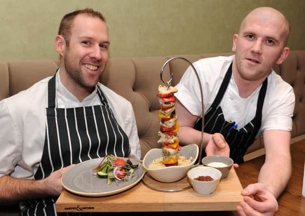 Head chef Paul Crossland and sous chef Gavin Milligan with the hanging kebab dish at The Summer House, Abbeydale Road South. Picture: Andrew Roe