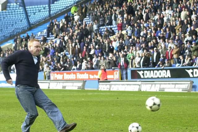 Actor and Owls fan Tommy Craig takes part in a penalty shoot out competition at half time on Sunday at Hillsborough