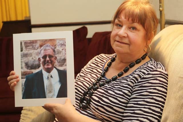 Audrey Musson is one of four widows of Staveley Chemicals workers who died from the rare brain cancer, Glioma. Pictured with a photo of her and late husband Neville.