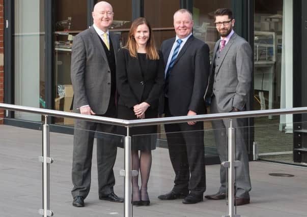 David Jones, Elizabeth Harrison, Damian Slingsby and Russell Holt. of Reward Finance Group.