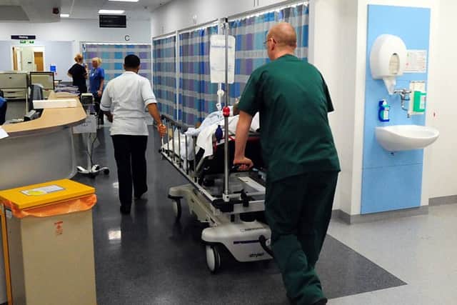 A generic stock photo of the Accident and Emergency (A&E) reception at Queen Elizabeth Hospital, Birmingham.