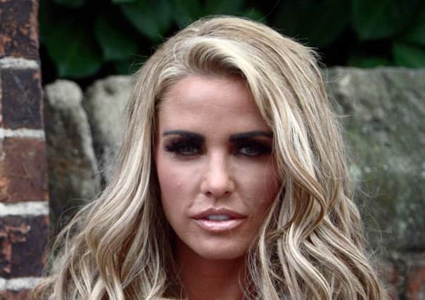 Katie Price outside the Oxford Union debating chamber in Oxford where the glamour model will speak to students.  PRESS ASSOCIATION Photo. Picture date: Wednesday October 12, 2011. The 33-year-old, who shot to fame as Jordan in the late 90s, will follow in the footsteps of greats such as Winston Churchill, the Dalai Lama and, more recently, Pamela Anderson by speaking in the debating chamber. A spokeswoman for the twice-married celebrity said she will address the audience about her life and colourful career. As well as being a successful glamour model, the mother-of-three has had her own reality TV series, equestrian range, four autobiographies and was a contestant on I'm a Celebrity ... Get Me Out Of Here, where she met her first husband, pop star Peter Andre. Price, who also has a children's book range and last month launched her own magazine, is expected to speak for around an hour before taking questions. See PA story SHOWBIZ Price. Photo credit should read: Steve Parsons/PA Wire