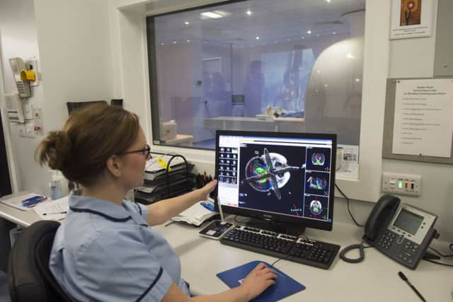 Sheffield Childrens Hospital Radiologist Helen Browne looking at a scan by the 3T MRI scanner
