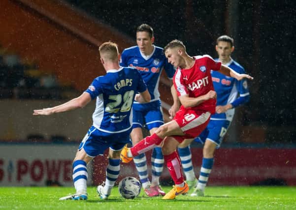 Rochdale vs Chesterfield - Jake Orrel has a shot blocked - Pic By James Williamson