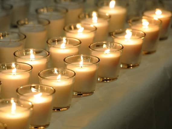 Candles lit during last year's Holocaust Memorial Service at the Winter Gardens. Picture: Andrew Roe