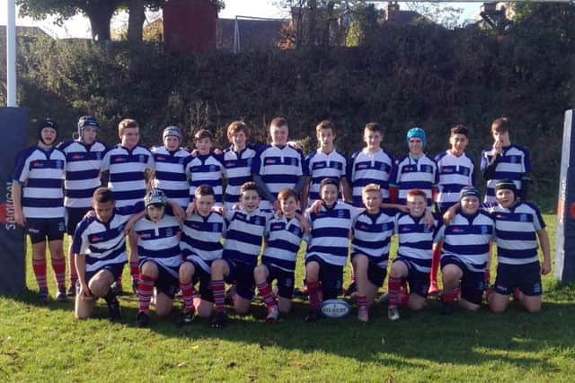 George Parsons, front row fourth from left,with his rugby team.