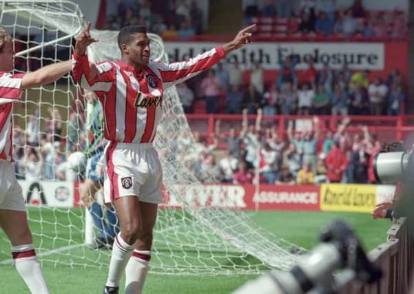 Brian Deane in the famous red and white stripes