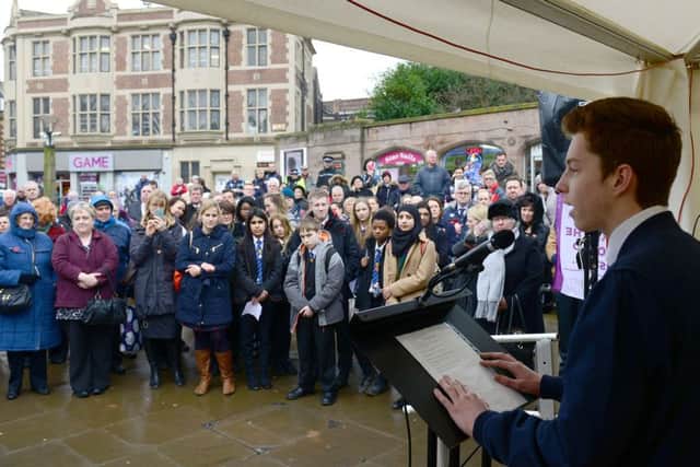 Holocaust Memorial Day event - Don't Stand By - held in All Saints Square in Rotherham. Local schoolboy Tom Evans makes a speech. Picture Scott Merrylees