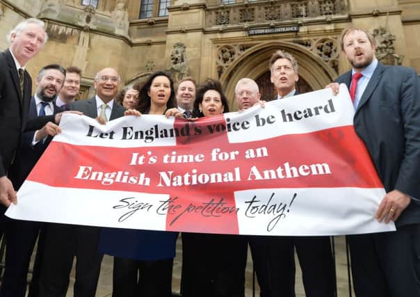 MPs sing Jerusalem, as they launch the English National Anthem E-petition, outside the Houses of Parliament in London