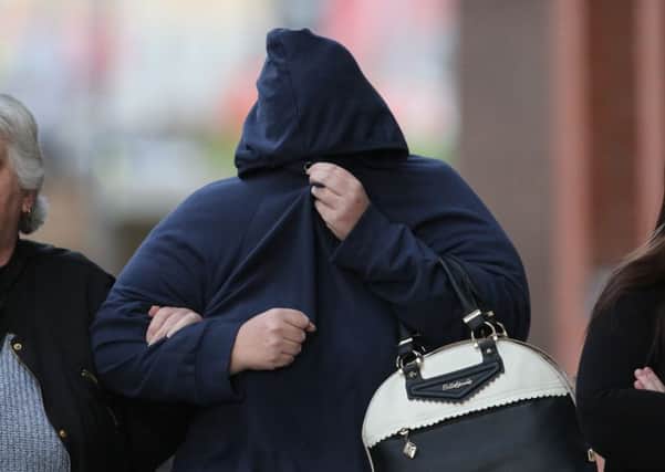 Shelley Davies, 40, (blue hooded top) outside Sheffield Crown Court. Picture: Ross Parry