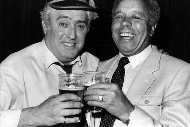 Alick with former team-mate turned TV comedian Charlie Williams.