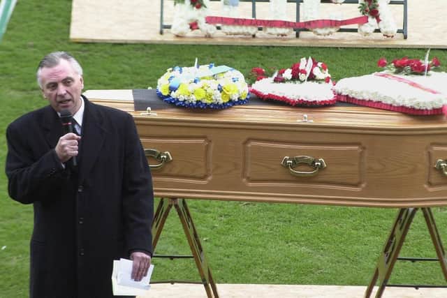 John Ryan pays tribute at Alick's funeral.