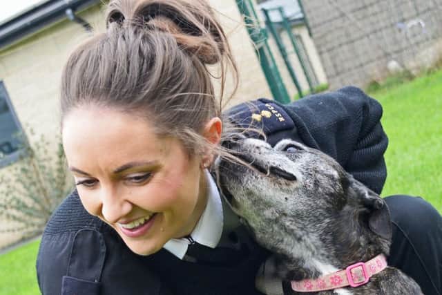 Jennie Ronksley, RSPCA Inspector, pictured with 10-year-old Staffordshire Bull Terrier Jodie. Picture: Marie Caley NSST RSPCA MC 2