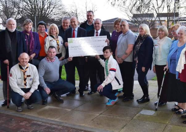 John Healey MP and Peter McNestry Chairman of the Coalfields Regeneration Trust, presenting Goldthorpe groups with a micro-grant cheque.