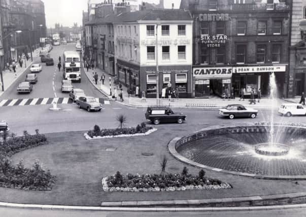 A view of the Goodwin Fountain and flower beds at the top of Fargate, taken from Sheffield Town Hall - 10th August 1967

H.L. Brown
Cantors

Sheffield