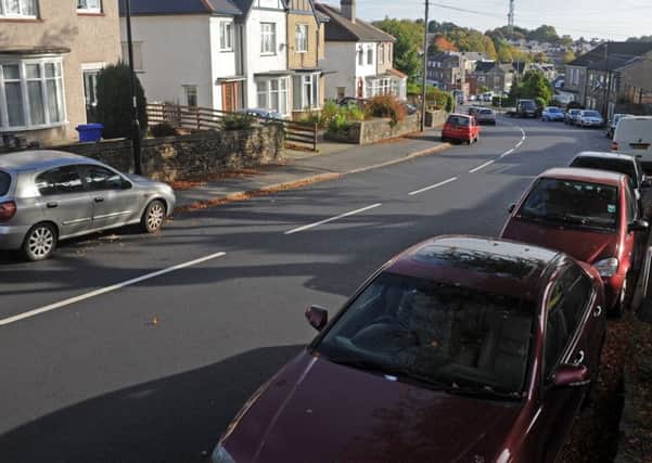 Motorists are being confused by the road markings on Sandygate Road, with one side of the road having enough room for a lorry and the other barely having enough room for a car. Picture: Andrew Roe