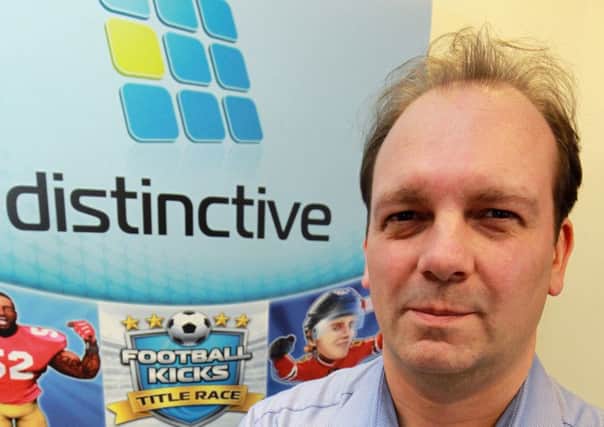 Games company Distinctive Developments has been waiting since April for a fibre optic broadband line. Pictured is Nigel Little.