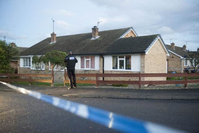 Police outside a property on Beech Close Brierley in Barnsley where 2 bodies were discovered earlier today
Picture Dean Atkins