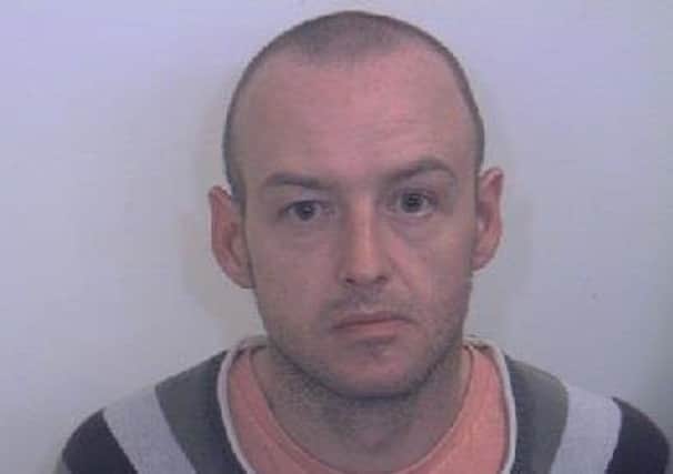 Darren Smith was jailed for six years after stealing children's Christmas presents