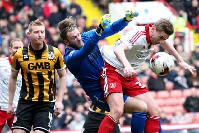 Chris Neal, pictured in action for Port Vale against Sheffield United.