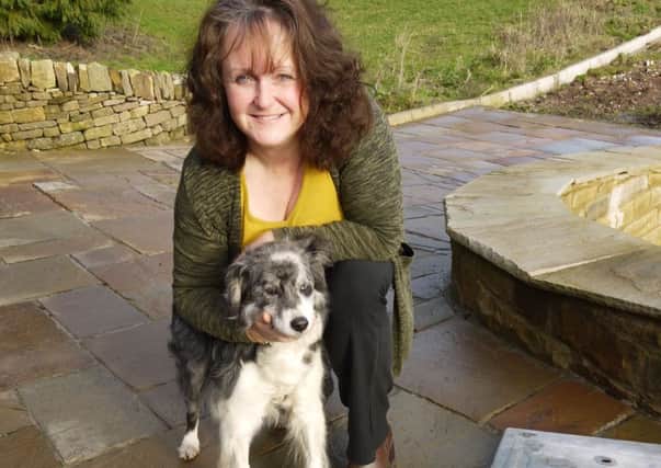Border collie Kia is lucky to be alive after nearly drowning in a deep septic tank. She is pictured with owner Hazel Higgins.