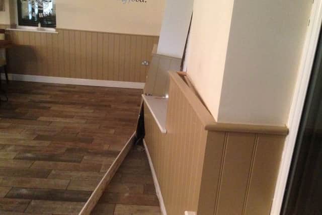 Damage to Harry's Fish Bar and restaurant after a car ploughed into the building