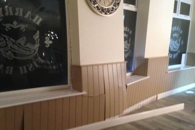 Damage to Harry's Fish Bar and restaurant after a car ploughed into the building