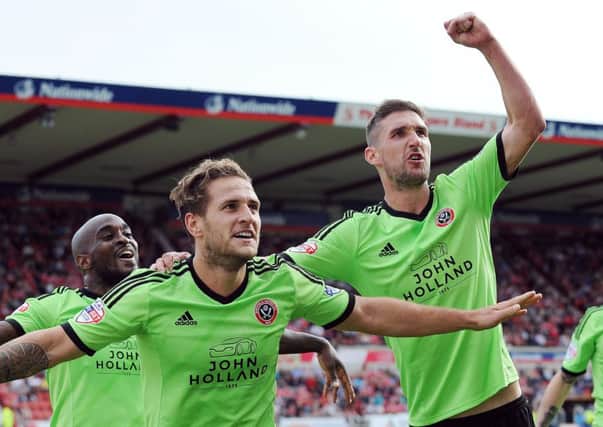 Billy Sharp (centre) and Chris Basham (right) are expected to be fit for Saturday's match against Wigan