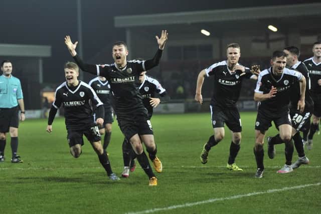 Barnsley players celebrate thewir goal at Highbury