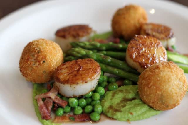 Food review at Thyme Cafe on Glossop Road, Sheffield. Pan fried scallops and smoke salmon croquettes dish.