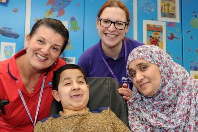 Amanda Hodgson, matron for medicine and Amika Challacombe, nurse for Wellchild with Ibraheem Nadeem, 12 and his mum Tazim Ghani at the launch of the new Sheffield Wellchild children's nurse