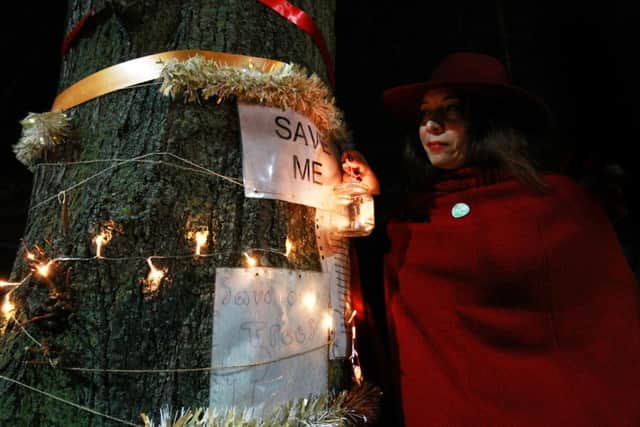 Sheffield tree campaigners' held a Christmas celebration with carols and mulled wine under Delilah, Tree 1, on Rustlings Road. Pictured is Louise Wilcockson.