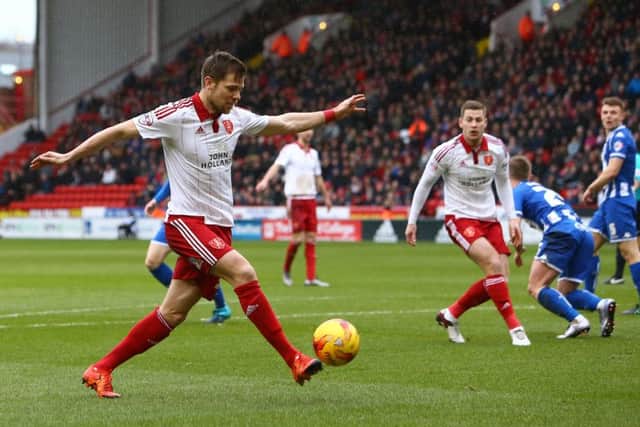 Sheffield Uniteds Dean Hammond shoots at goal in the 2-0 home defeat against Wigan. Photo: Sport Images