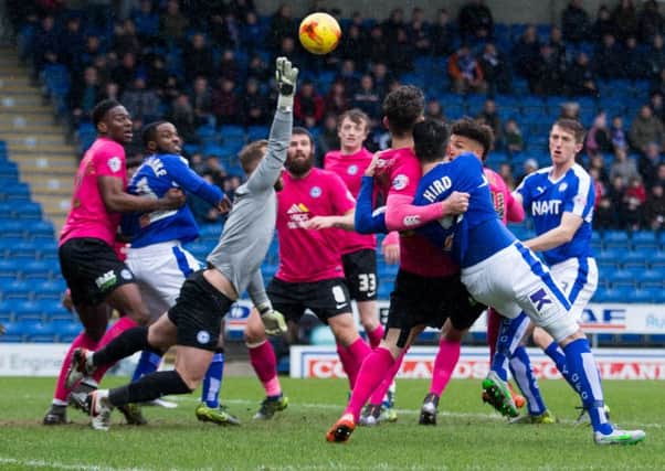 Chesterfield are denied at a corner by Peterborough goalkeeper Ben Alnwick.  Photo:  James Williamson