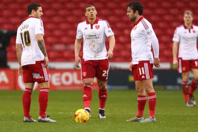 Sheffield Uniteds Billy Sharp, Che Adams and Jose Baxter dejected after the Wigan opening goal