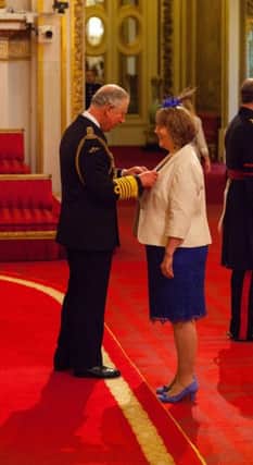 Helen Milner from Sheffield is made an OBE (Officer of the Order of the British Empire) by the Prince of Wales at Buckingham Palace. PRESS ASSOCIATION Photo. Picture date: Thursday February 4, 2016. Photo credit should read: Dominic Lipinski/PA Wire