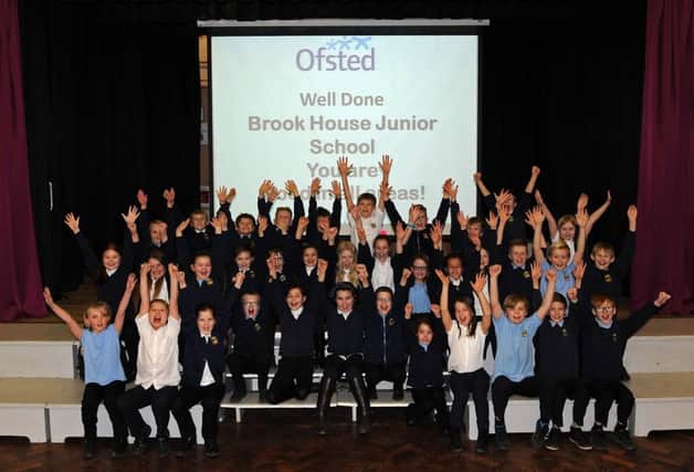 Pupils of Brook House Junior School celebrate after they achieved a good Ofsted rating. Picture: Andrew Roe