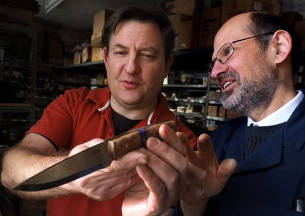 Arthur Wright and Son pocket knives: Director John Maleham (right) looking at a display knife with general manager Michael Harrison