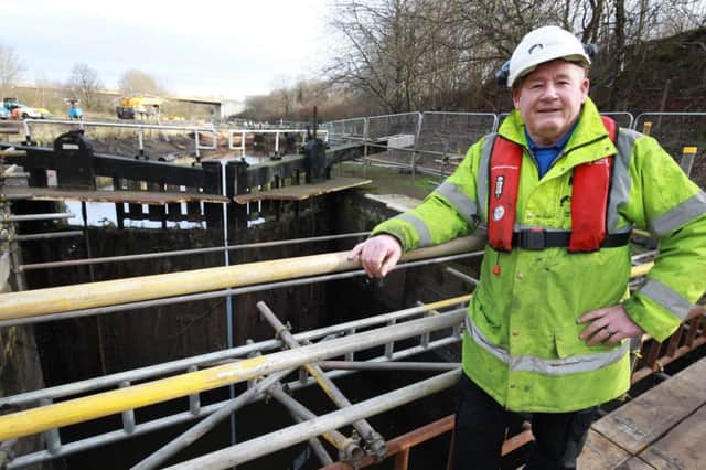 A major repair project to Tinsley's Locks is underway by the Canal & River Trust as part of a Â£1/2 million restoration to this 19th century lock flight. Pictured is work on no 11 lock. On Sunday 14 February the Trust is inviting the local community to a public open day at Lock 11, next to Meadowhall Shopping Centre. Visitors will be able to walk along the bed of the lock which is over 15 feet deep and get an insight into canal maintenance by speaking to the specialist craftsman. Pictured is John Cottam, Construction Supervisor North East, at lock 11 where they are replacing the lock gates.